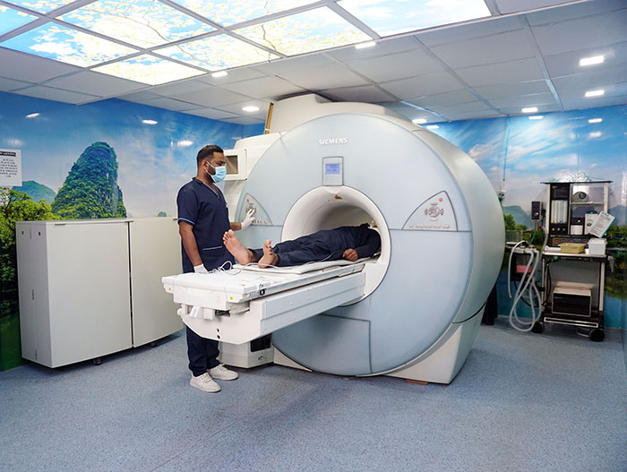 radiologist using an MRI machine